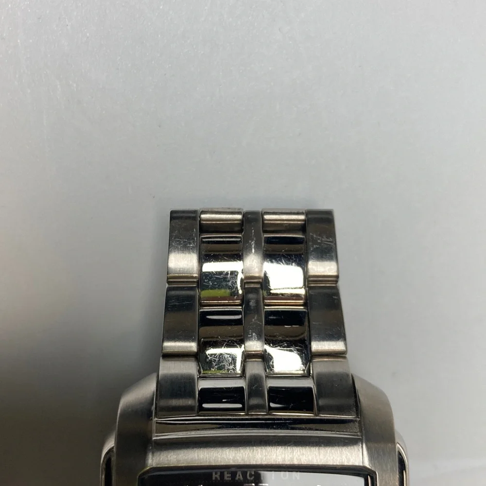 Kenneth Cole Reaction tank watch, stainless, black dial, new battery